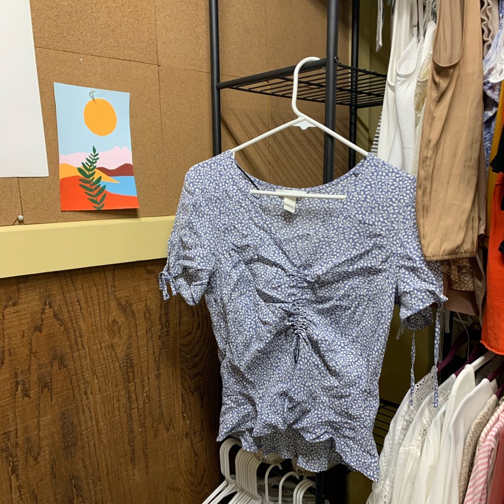 A blue and white top